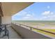 Balcony with seating and railing, offering breathtaking ocean views at 901 S Atlantic Ave # 208, Ormond Beach, FL 32176