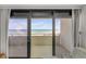 Balcony showcasing stunning ocean views, with a seating area and a glimpse of the sandy beach at 901 S Atlantic Ave # 208, Ormond Beach, FL 32176