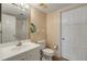 Compact bathroom with a vanity, toilet, and shower; nautical accents add a charming touch at 901 S Atlantic Ave # 208, Ormond Beach, FL 32176