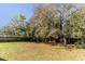 Backyard view with trees at 904 Bordeaux Pl, Orlando, FL 32808