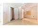 This bedroom features tile flooring, a ceiling fan, and an open closet at 904 Bordeaux Pl, Orlando, FL 32808