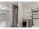 Well lit bathroom with a pedestal sink and shower with decorative wood accent wall at 10031 Union Park Dr, Orlando, FL 32817