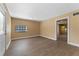 A bright room features ceramic tile flooring, neutral paint, and a door with window pane at 10031 Union Park Dr, Orlando, FL 32817