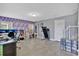 Spacious bedroom area with natural light and tile flooring at 10566 Green Ivy Ln, Orlando, FL 32832