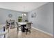 Bright dining area featuring modern decor and a window with a view at 10566 Green Ivy Ln, Orlando, FL 32832
