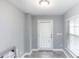 Bright entryway with a window for natural light, clean walls and tile floor at 10566 Green Ivy Ln, Orlando, FL 32832
