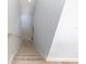 Carpeted staircase ascending to the upper level with a white railing and neutral walls at 10566 Green Ivy Ln, Orlando, FL 32832
