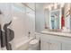 Bathroom featuring a tub and shower combination, and a granite countertop vanity at 1094 Red Maple Way, New Smyrna Beach, FL 32168