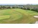 Golf course with well-maintained greens, sand traps, and driving range at 1094 Red Maple Way, New Smyrna Beach, FL 32168