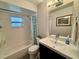 Cozy bathroom featuring a bathtub, toilet, and vanity with modern faucet at 1197 Village Forest Pl, Winter Park, FL 32792