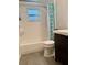 Cozy bathroom featuring a tiled shower and tub combination and modern vanity at 1197 Village Forest Pl, Winter Park, FL 32792