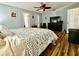 Light-filled bedroom with hardwood floors and a spacious closet at 1197 Village Forest Pl, Winter Park, FL 32792