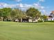 The large yard and patio area overlooks the golf course at 13106 Alderley Dr, Orlando, FL 32832