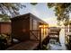 Tranquil boathouse on the water at sunset, featuring a covered dock area and relaxing bench seating to enjoy lake views at 1400 Alabama Dr, Winter Park, FL 32789