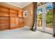 Bonus room featuring a built-in bookcase and french doors that lead to the outdoors at 1400 Alabama Dr, Winter Park, FL 32789