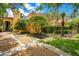 A picturesque view of the home exterior, highlighting the lush landscaping and inviting curb appeal at 1400 Alabama Dr, Winter Park, FL 32789