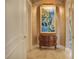 Hallway featuring a vintage-style dresser and an ornate painting at 1400 Alabama Dr, Winter Park, FL 32789