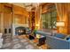 Inviting living room with wood accents, a fireplace, built-in shelving, and natural light at 1400 Alabama Dr, Winter Park, FL 32789