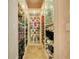 Shoe closet featuring custom shelving for ample shoe storage at 1400 Alabama Dr, Winter Park, FL 32789