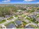 Neighborhood aerial view showing lush landscaping, mature trees, and well-kept homes at 1609 River Birch Ave, Oviedo, FL 32765