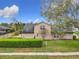 Aerial view of home's backyard and surrounding neighborhood at 1609 River Birch Ave, Oviedo, FL 32765