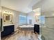 Beautiful bathroom featuring a corner tub, tiled shower, and double sink vanity at 1609 River Birch Ave, Oviedo, FL 32765