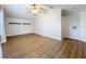 Bright living room with wood floors, ceiling fan, and vaulted ceiling with crown molding at 1609 River Birch Ave, Oviedo, FL 32765