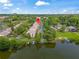 Aerial view of waterfront property with mature landscaping and lake access for boating activities at 200 Maitland Ave # 12, Altamonte Springs, FL 32701