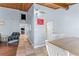 Well-lit hallway providing seamless access to the dining area, living spaces, and other parts of the home at 200 Maitland Ave # 12, Altamonte Springs, FL 32701