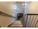 Interior stairwell leading to a unit with natural lighting at 200 Maitland Ave # 12, Altamonte Springs, FL 32701