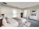 Cozy main bedroom featuring neutral walls, plush carpet, and a dresser at 2015 Sloans Outlook Dr, Groveland, FL 34736