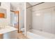 Bathroom featuring a shower-tub combo, tile flooring, neutral color scheme, and a single sink vanity at 2201 Coach House Blvd # 3, Orlando, FL 32812