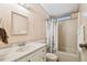 Bathroom featuring vanity and tub with curtain at 2706 Cranmoor Dr, Kissimmee, FL 34758