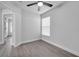 A bright bedroom with wood-look flooring and neutral walls at 2902 Egrets Landing Dr, Lake Mary, FL 32746