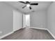 Large bedroom featuring wood-look flooring and a spacious closet at 2902 Egrets Landing Dr, Lake Mary, FL 32746