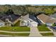 Aerial view of this inviting single-Gathering home with a well-manicured front lawn at 2902 Egrets Landing Dr, Lake Mary, FL 32746