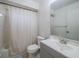 Bathroom with shower and updated vanity and tile flooring at 3100 Tall Grass Pl, Kissimmee, FL 34743