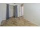 Bedroom with tiled floors, closet, and natural light at 3100 Tall Grass Pl, Kissimmee, FL 34743