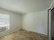 Bedroom featuring neutral walls, tile floors and a window at 3100 Tall Grass Pl, Kissimmee, FL 34743