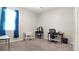 Neutral bedroom with a vanity, desk, and plush carpeting at 3108 Dark Sky Drive, Harmony, FL 34773