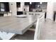 Dining room featuring a weathered wooden table and seating for four at 3108 Dark Sky Drive, Harmony, FL 34773