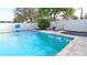 Inviting pool area with a basketball hoop and lovely outdoor seating at 3108 Dark Sky Drive, Harmony, FL 34773