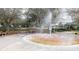 The vibrant splash pad water feature is the focal point of this community park at 3108 Dark Sky Drive, Harmony, FL 34773