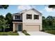 Charming two-story home featuring a two-car garage, neutral color palette and well-manicured front yard at 3852 Bluethread Way, Kissimmee, FL 34759