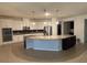 Well-lit kitchen featuring stainless steel appliances, granite countertops, white cabinetry, and a mosaic backsplash at 3942 Green Sabal Dr, Orlando, FL 32824