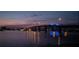 Scenic night view featuring a bridge, city lights, and water reflections, highlighting the vibrant nightlife at 415 N Halifax Ave # 216, Daytona Beach, FL 32118