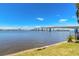 Scenic waterfront view with a bridge, showcasing the serene location and beautiful blue skies at 415 N Halifax Ave # 216, Daytona Beach, FL 32118