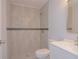 A clean bathroom features tiled shower, modern fixtures, and ample lighting at 532 W Park St, Lakeland, FL 33803