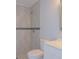 A shower and toilet in bathroom at 532 W Park St, Lakeland, FL 33803