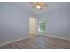 A room with wood floors, window, and ceiling fan at 532 W Park St, Lakeland, FL 33803